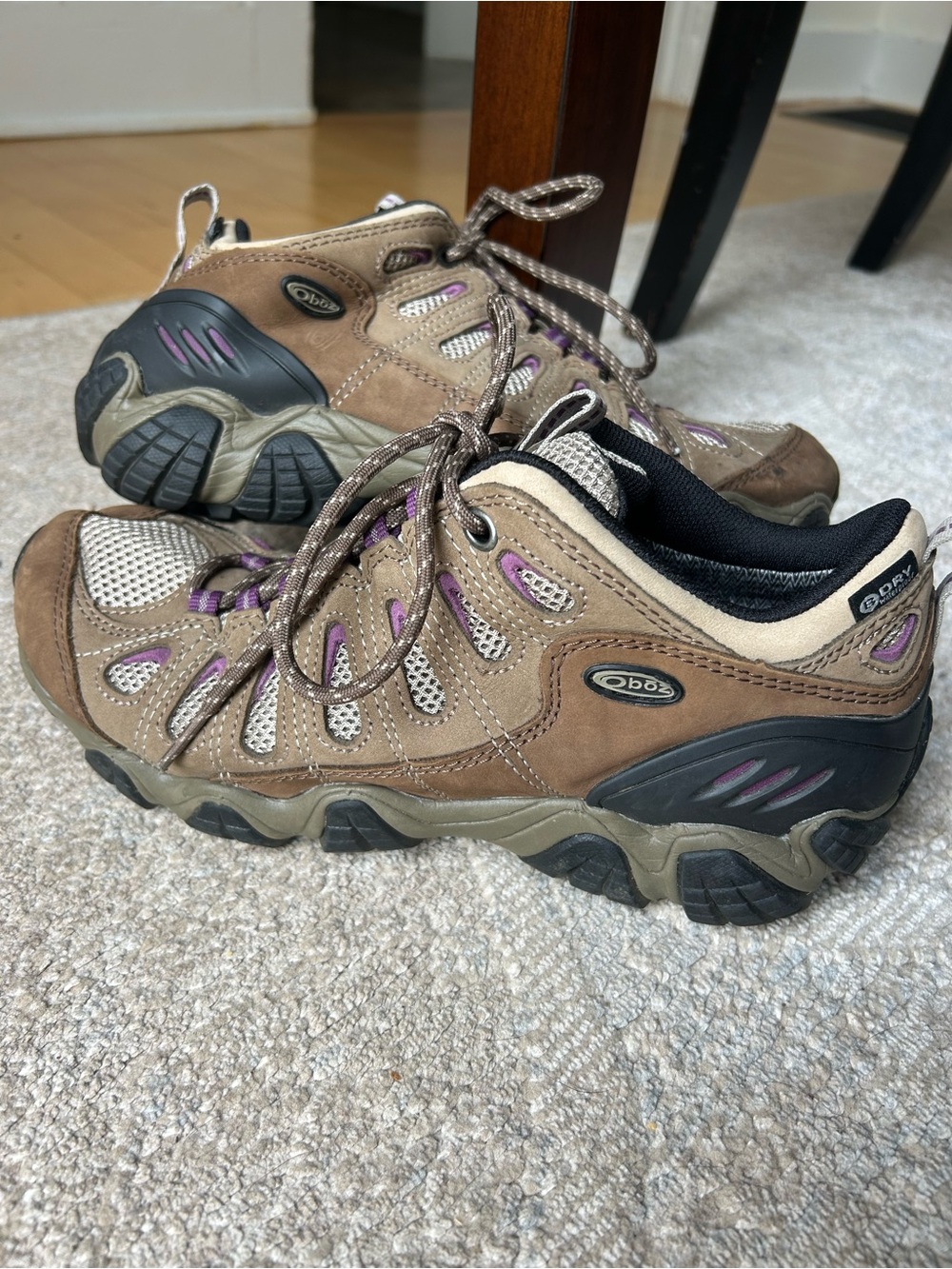 Oboz Women's Sawtooth II Low B-Dry hiking shoes in a brown and purple